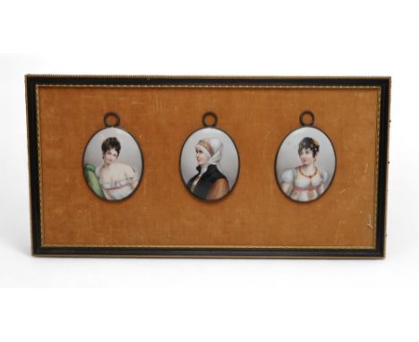 A GROUP OF THREE PORTRAIT MINIATURES all depicting a maiden, transfer printed and overpainted, each mounted in a frame and fu