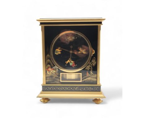 A JAEGER-LECOULTRE 'ATMOS CHINOISERIE' CLOCK the gilt-brass frame mounted with black lacquered panels decorated with figures 