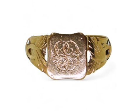 A FRENCH 18CT GOLD SIGNET RING leaf design shoulders, monogramed CG, stamped with the french eagles head hallmark, finger siz