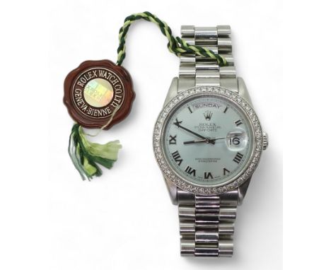 A PLATINUM &amp; DIAMOND ROLEX  oyster perpetual day-date. Made in platinum throughout, with Swiss Chamois head strike hallma