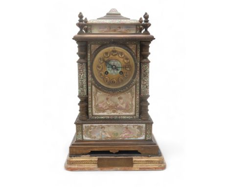 A LATE 19TH CENTURY FRENCH CHIMING MANTEL CLOCK with champleve enamel and painted porcelain panels depicting cherubs, the gil