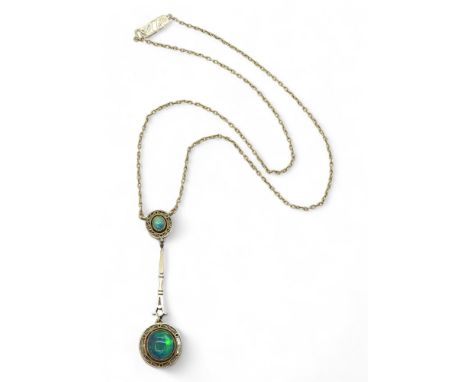 AN EDWARDIAN BLACK OPAL NECKLET made from 15ct gold, the lower opal measures 10.3mm x 9.5mm x (approx 7.8mm) length of the pe