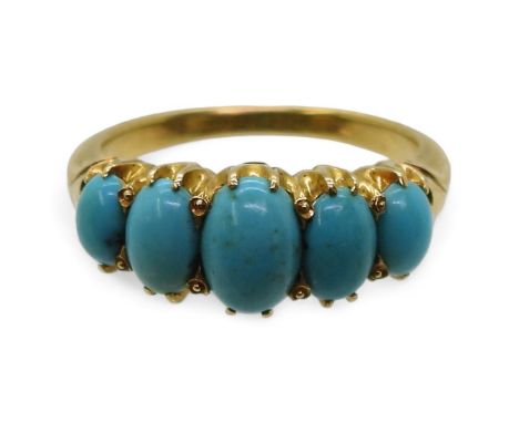 A TURQUOISE VINTAGE RING the classic mount is set&nbsp; with five oval turquoise gemstones. The largest turquoise is approx 7