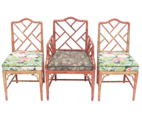 A SET OF THREE 20TH CENTURY AFTER CHIPPENDALE "COCKPEN" FAUX BAMBOO CHAIRS comprising armchair with red and gilt painted fram