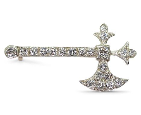 A DIAMOND AXE BROOCH set with estimated approx 0.80cts of brilliant cut diamonds, to the yellow and white metal mount. Dimens