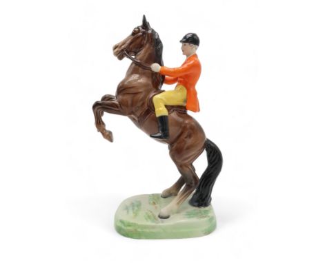 BESWICK HUNTSMAN ON REARING HORSE model 868, first version with yellow breeches and orange jacket, printed mark to base Condi