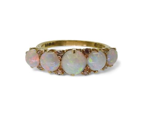 OPAL &amp; DIAMOND FIVE STONE RING nice lively opals, with rose cut diamond accents set between, in classic 18ct gold scroll 