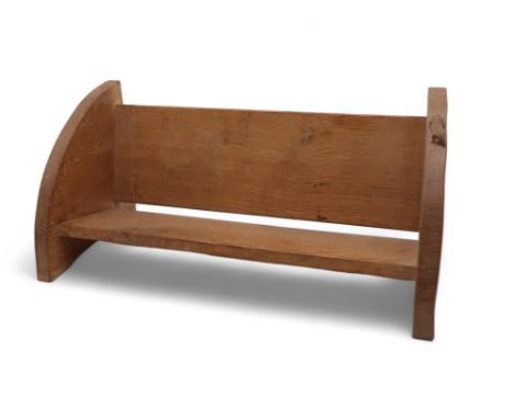 ROBERT MOUSEMAN THOMPSON OF KILBURN OAK BOOK TROUGH of single shelf form with carved mouse to one of the curved end supports,