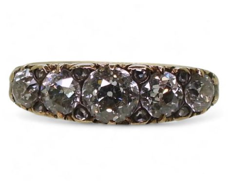 A FIVE STONE DIAMOND RING the five diamond are set in a classic scroll mount, with an estimated approximate diamond total of 