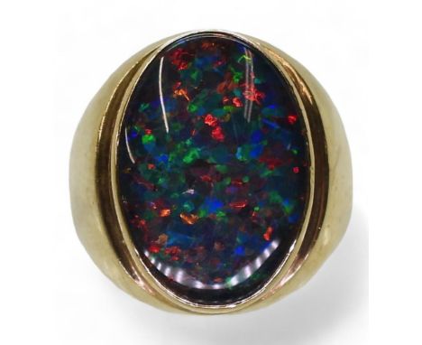 A 9CT GOLD OPAL TRIPLET RING in the classic signet ring style, finger size T1/2, weight 10.3gms Condition Report:Medium gener