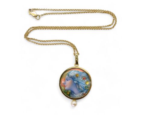 AN 18CT GOLD ENAMEL PENDANT a ladies face in profile hand enamelled in colours, set in an 18ct gold mount, and set with a pea