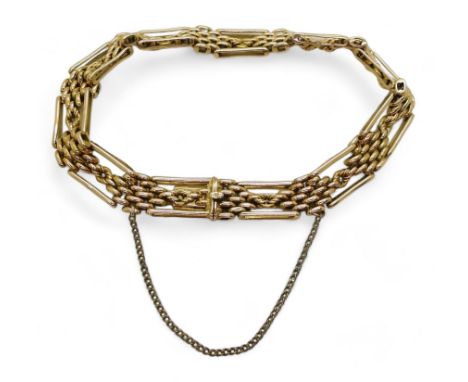 A FANCY LINK GATE BRACELET made in 15ct gold, length 21cm, weight 24.1gms Condition Report:Available upon request