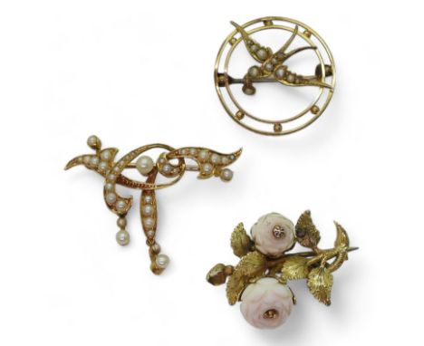 THREE VINTAGE BROOCHES a bright yellow metal roses brooch, set with two pink coral carved roses, length 2.8cm, weight 4.8gms.