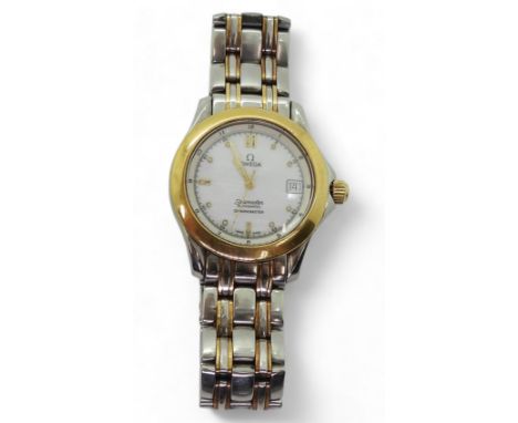 AN OMEGA SEAMASTER AUTO CHRONOMETER 18ct gold bezel, winder and strap detail, with a white dial with dot and baton numerals, 