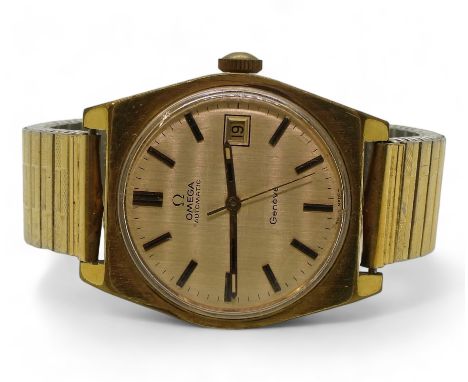 A OMEGA AUTOMATIC GENEVE with gold plated case and strap, gold coloured dial, baton numerals and hands. Diameter of the case 
