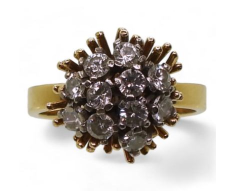 AN 18CT GOLD RETRO RING set with a cluster of diamonds, with an estimated approximate combined total of 0.33cts. Hallmarked B