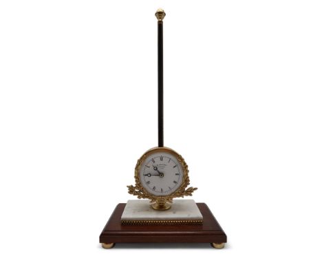 THWAITES &amp; REED, LONDON REPRODUCTION LIMITED EDITION GRAVITY CLOCK  with white enamel dial in gilded laurel wreath case, 