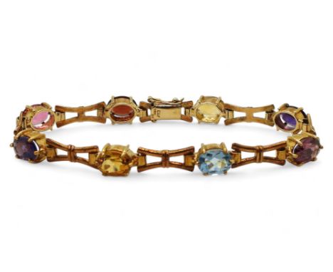 A MULTI GEM BRACELET made in 9ct gold by Cropp &amp; Farr, set with oval gemstones to include amethyst, citrines and garnet, 