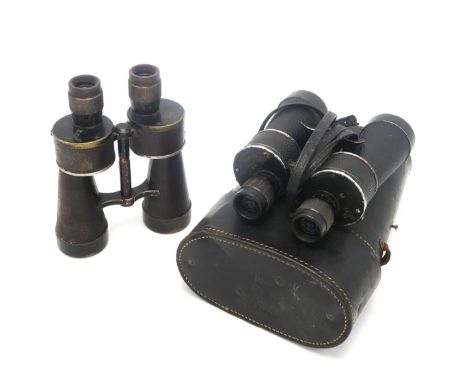 A PAIR OF WW2 GERMAN KRIEGSMARINE 7x50 BINOCULARS BY "beh" (ERNST LEITZ, WETZLAR) The left top plate stamped "KF", the right 