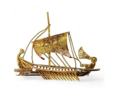 A GREEK WARSHIP BROOCH made in 18ct gold. Dimensions 5cm x 4cm, weight 8.3gms Condition Report:Light general wear