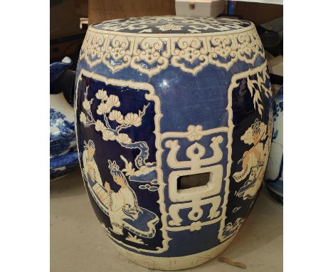 A Chinese ceramic stool decorated with musical panels etc. height 42cm. 