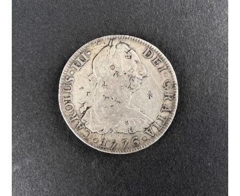 WORLD COINAGE: A 1776 Mexico Spanish Colony Carlos III 8 Reals silver coin bearing chop/counter marks, Chinese characters, we