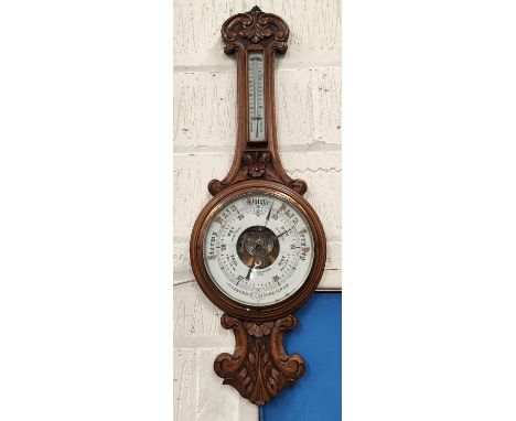 A Shearwater Lloyd of Liverpool Oak cased aneroid barometer carved case with open workings&nbsp;&nbsp; 