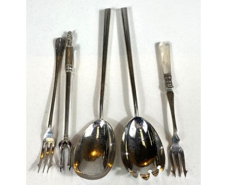 A pair of hallmarked silver salad servers Birmingham 1910, a hall marked silver pickle fork Sheffield 1939 3.9oz, a pearl han