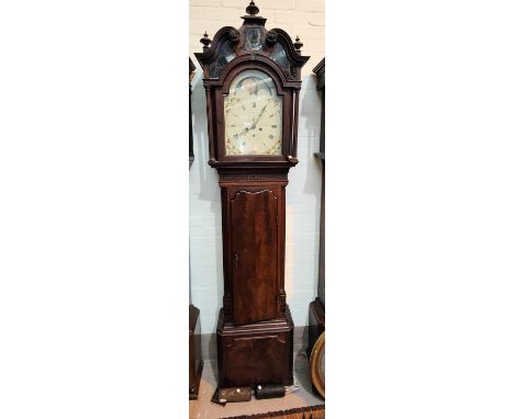 A late 18th century mahogany longcase clock by Wignall Ormskirk, the hood with blind swan neck pediment, turned finials and g
