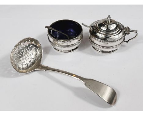 A hallmarked silver sieving ladle and two cruet pots, various assay 4.8oz 