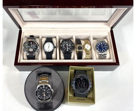 A gent's Citizen stainless steel watch in original box; another by Casio; 6 other ladies/gents watches 