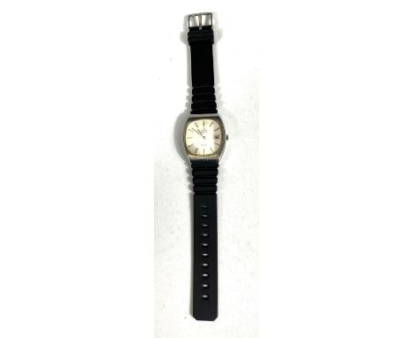 A vintage OMEGA Deville quartz wristwatch squared dial on rubber strap 