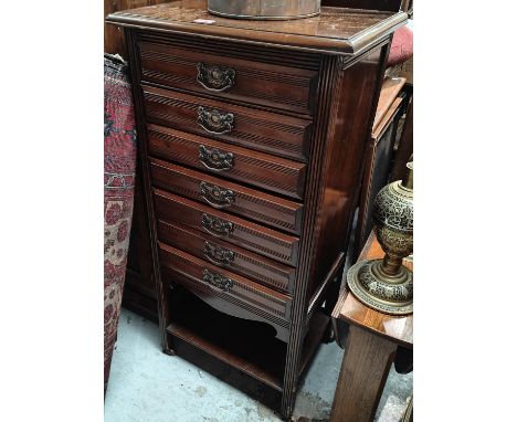 An Edwardian 7 height mahogany music cabinet with shelf under (breakfront) 