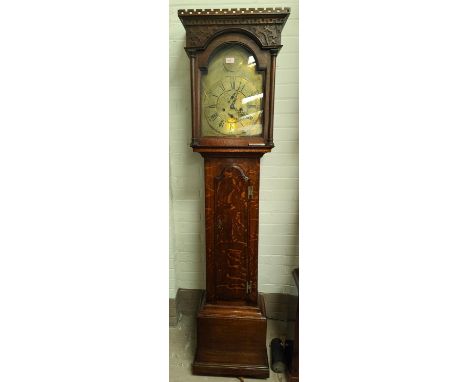 An 18th century oak longcase clock by Joseph Parish, Broughton, the hood with carved and pierced cornice and turned side pill