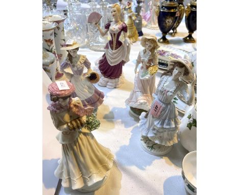 Four Royal Worcester figurines of ladies, Spring, Summer, Autumn and Winter. Limited editions.&nbsp; 