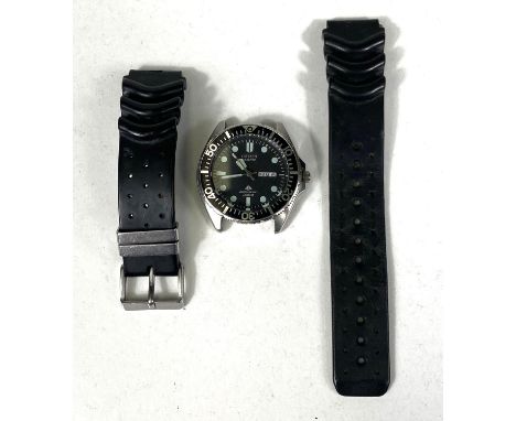 A vintage Citizen Quartz Promaster dive watch with black bezel, rubber bracelet.Condition: Not currently ticking; day date wo