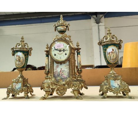 A reproduction French 3 piece clock garniture in gilt metal and porcelain effect 
