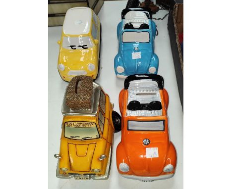 Four automobile money boxes to VW Beatles, a Mini and an Only Fools and Horses style 