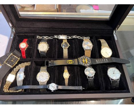 A watch box containing various ladies and gents watches, Timex etc 