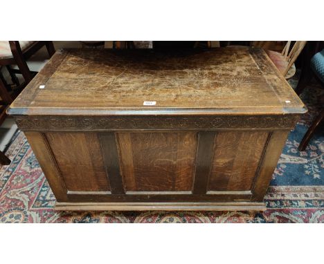 A 1930's panelled oak blanket box. 