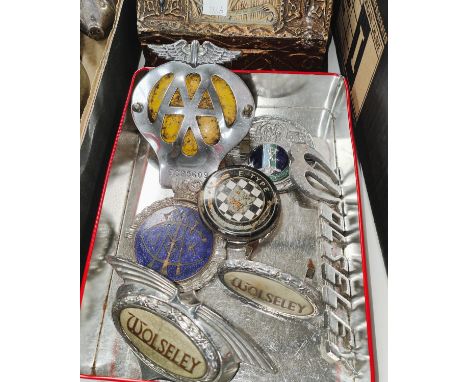 A selection of vintage Wolseley and other chrome badges, AA and others 