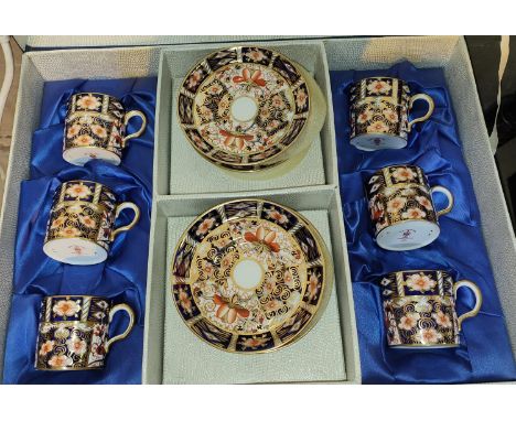 A Royal Crown Derby set of 6 coffee cans and saucers, Imari pattern 