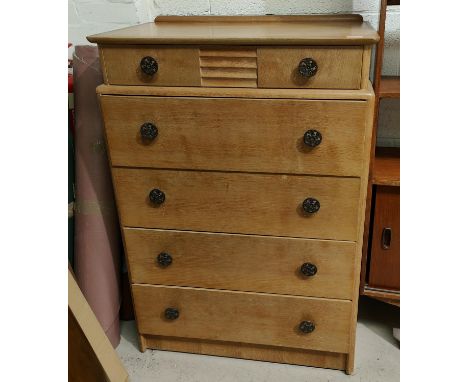 A 1950's light oak veneered chest of five drawers, ht. 112 x 46 x 76cm 