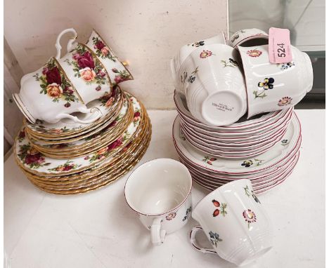 A Villeroy &amp; Bosch is 6 setting part tea service with cups sauces and side plates and a small selection of Royal Albert O