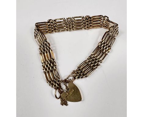 A 9 carat hallmarked gold gate bracelet with heart lock, 18gm 
