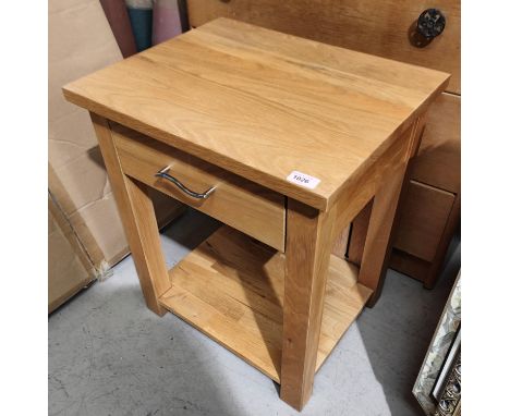 A light oak bedside table with single drawer and shelf under 