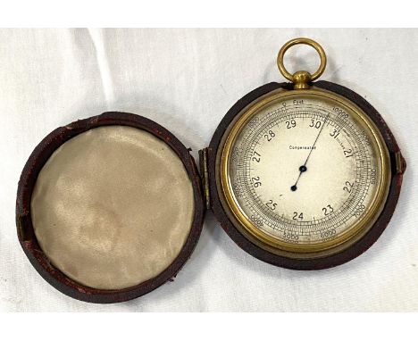 A 19th century brass cased pocket barometer in red leather case 