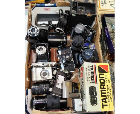 A collection of vintage SLR and other cameras, lenses and other accessories etc 