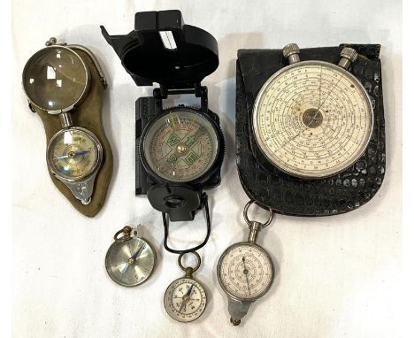 Two vintage brass field compasses, another with distance roller, another with magnifier; a Fowler Calculator (a/f) and a mode