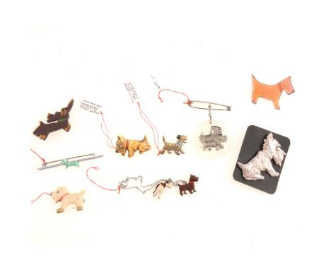 Novelty vintage Scottie Dog brooches, in white metal marked silver, other metals, glass, celluloid, 20mm to 58mm.